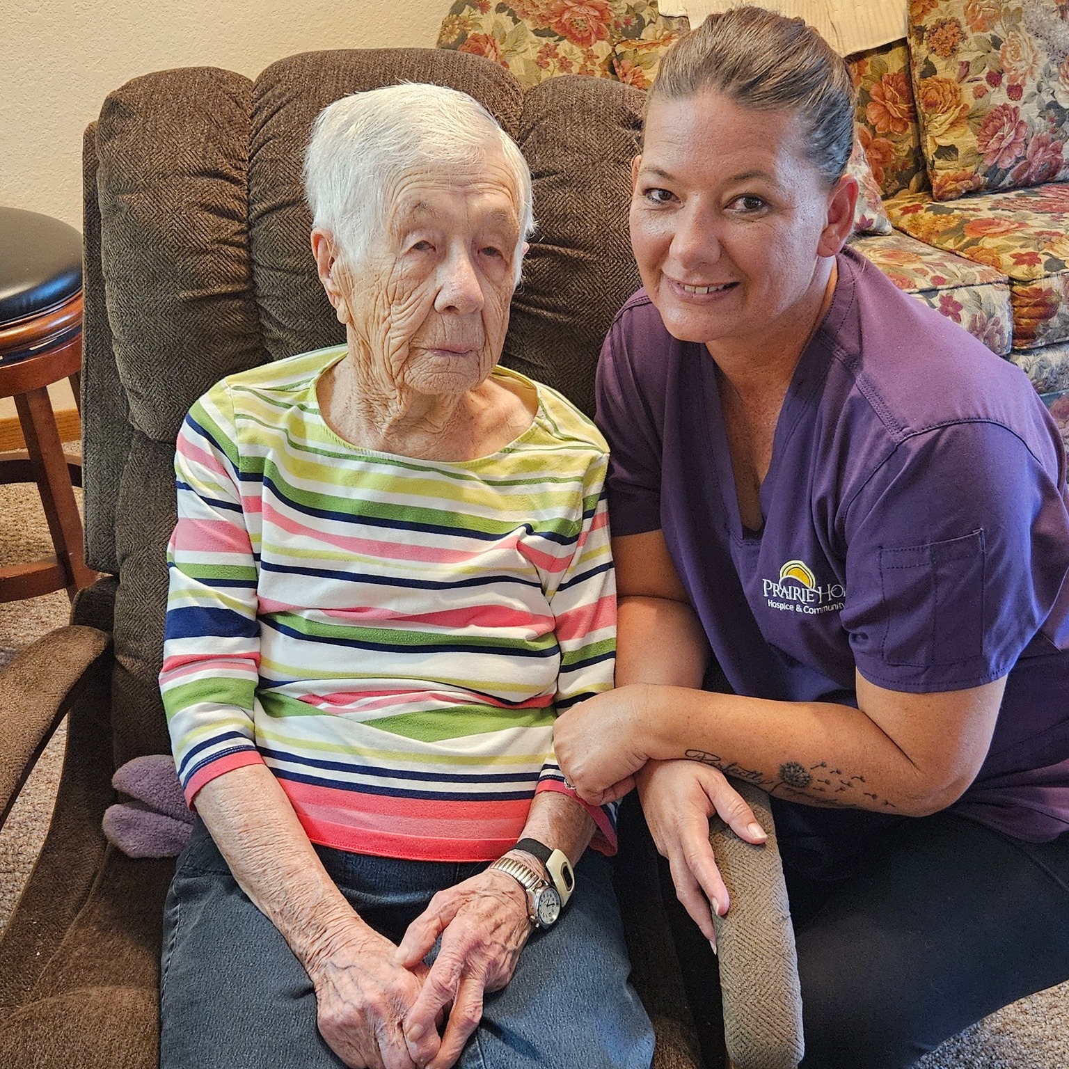 Image of a staff member and patient.